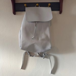 ZARA Trafaluc Light Gray Leather Backpack with Drawstring and Adjustable Straps